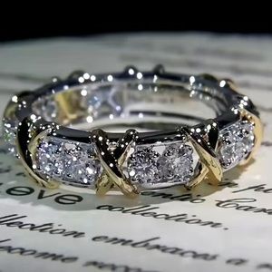 - 9.25 Sterling Silver - Tiffany Style-14k White Gold Finish & White Topaz